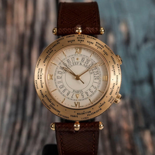 Van Cleef & Arpels  Traveler World Time Alarm Or Jaune 18kts -1990- Réf.123038 Cal.LeCoultre 911 -1990-