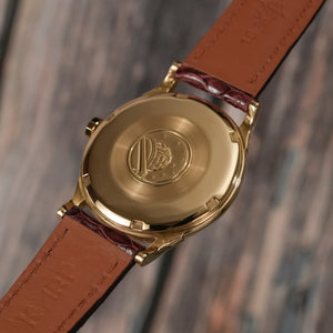 Omega Constellation or Jaune 18 k -1961- Réf.14381 Cal.Cal. 551 -1961-