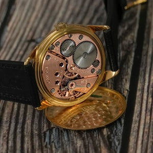 Omega Tresor or jaune 18K -1951- Réf. 2619  Cal.265/30T2 -1951-